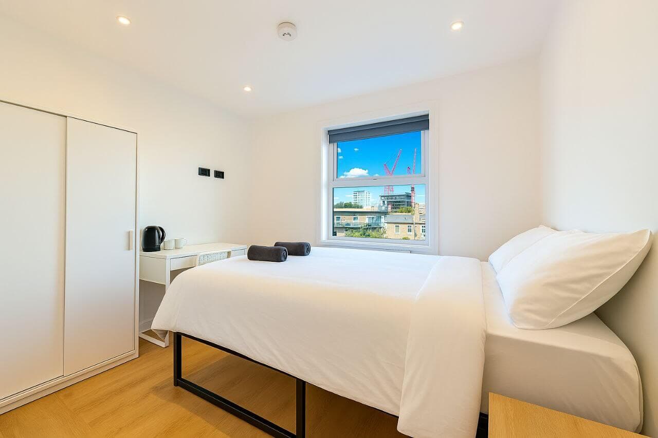 Modern bedroom with city views